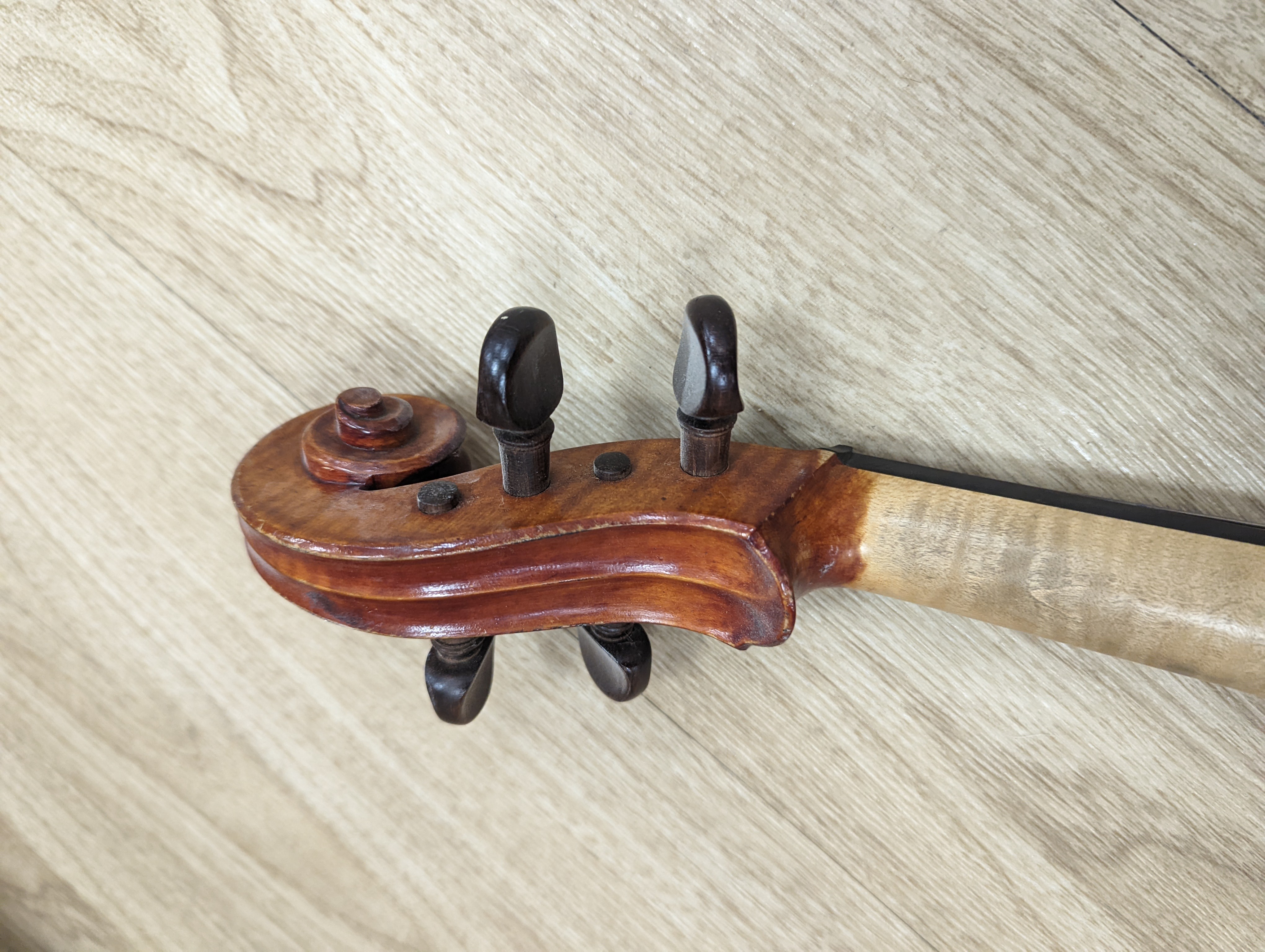 A Viola, assorted bows and a violin back